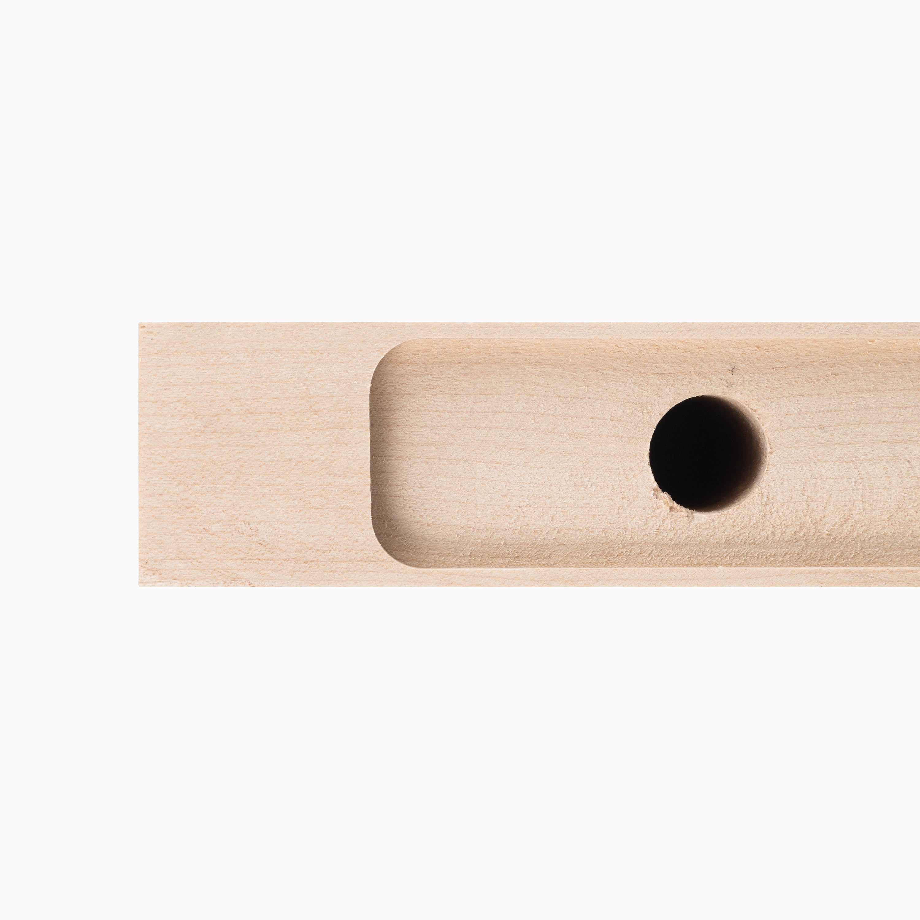 Close-up of Aksel Unfinished Mahogany Floating shelf showing smooth wood surface with recessed groove and drilled hole for mounting hardware