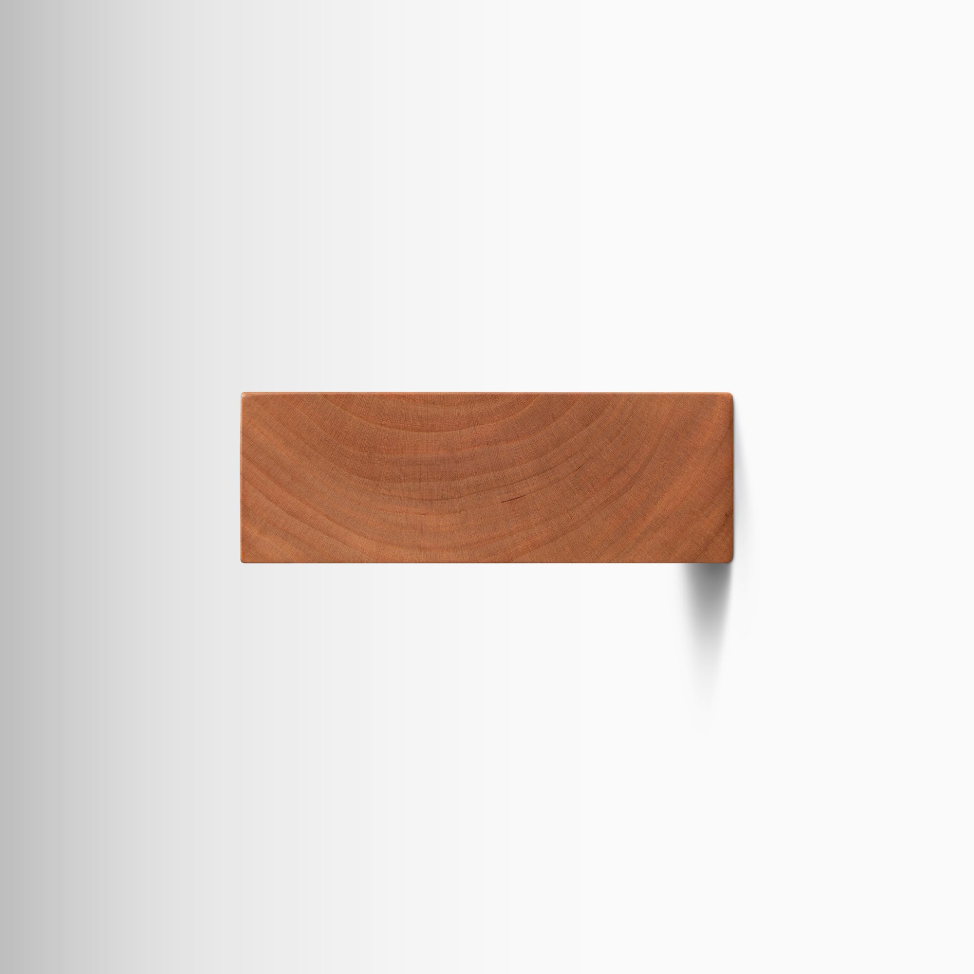 Small floating wall shelf in cherry hardwood