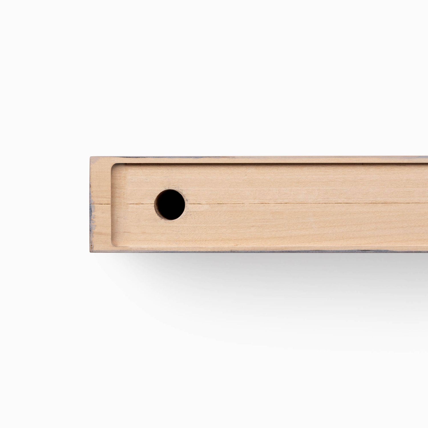 Close-up of hole detail in the Glenn Hatch Grey Floating Mantel showcasing durable wood floating shelf hardware design