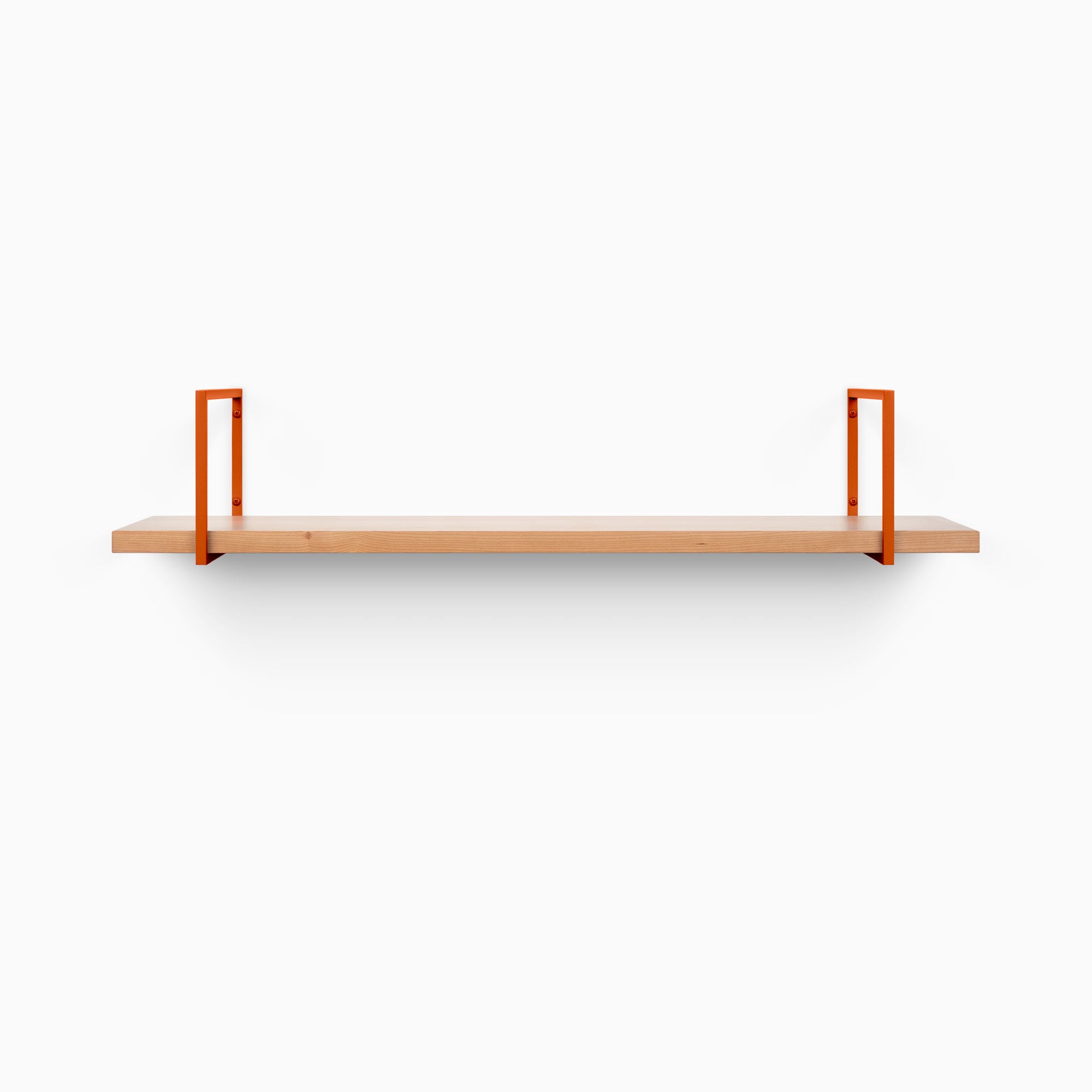 Bart Cherry Wall Shelf with warm cherry wood and bold orange metal floating shelf brackets for modern wall display and organization