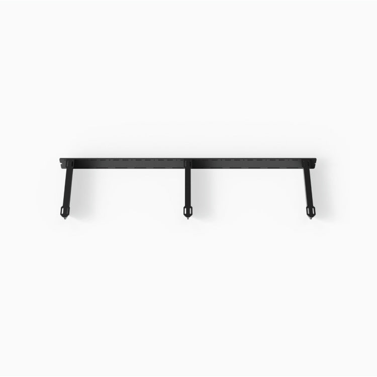 Matte black metal bracket system featuring three angled support arms designed for sturdy wall-mounted shelves in minimalist spaces.