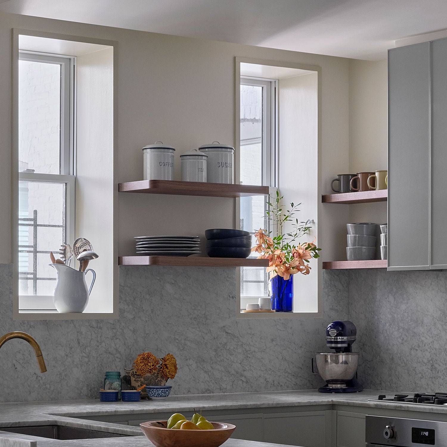 Clearance — Aksel RADius Walnut Shelf — 24" length x 10" depth x 1.75" thick floating shelves with walnut finish in modern kitchen setting