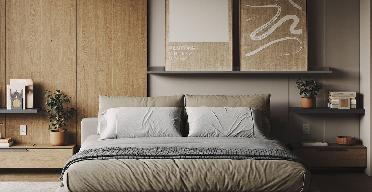 Minimalist bedroom with a neatly made bed framed by wood paneling floating wall shelves artwork and potted plants