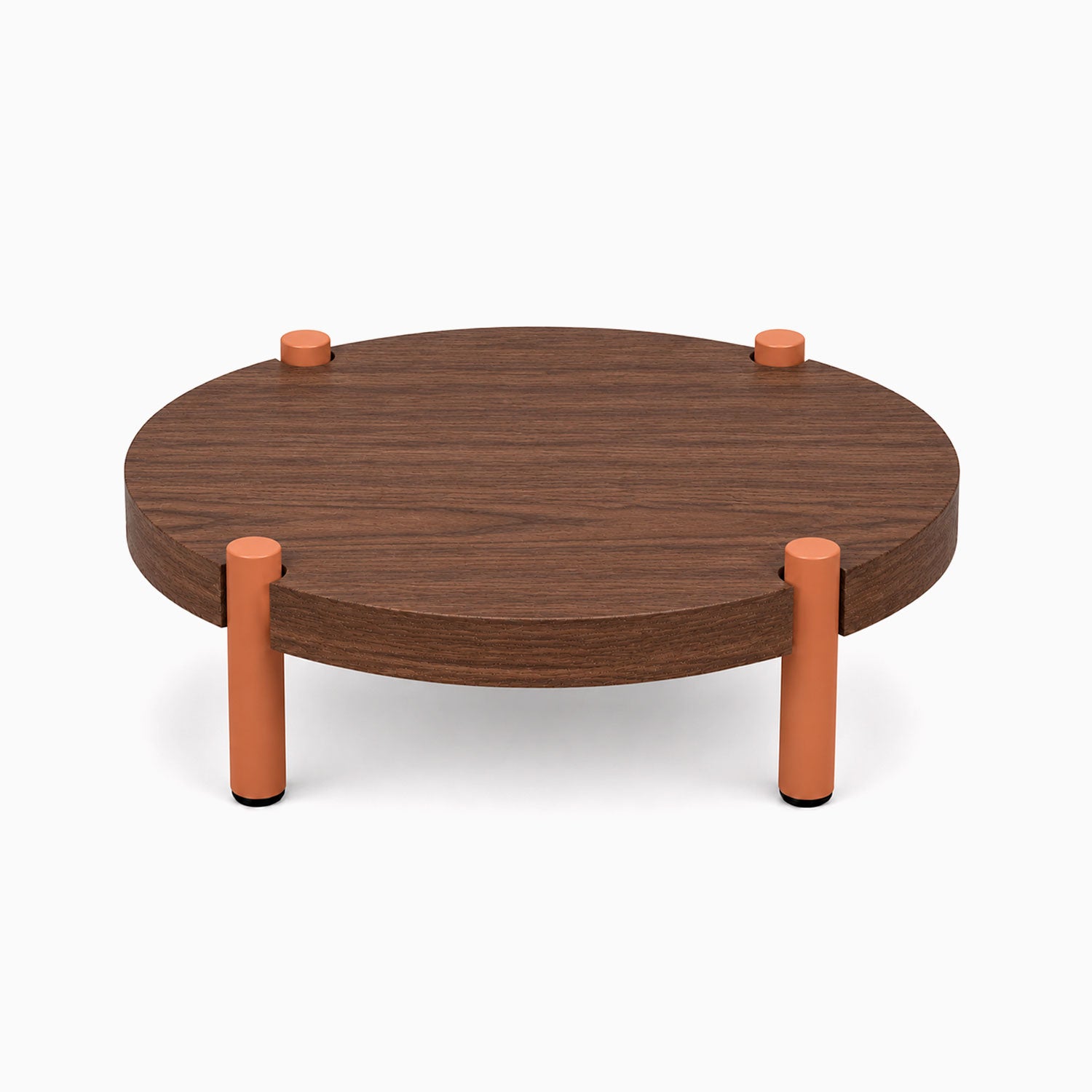 Low-profile Fern Plant Stand (Walnut) with a round solid hardwood surface and four short sturdy legs designed for minimalist display and decor.