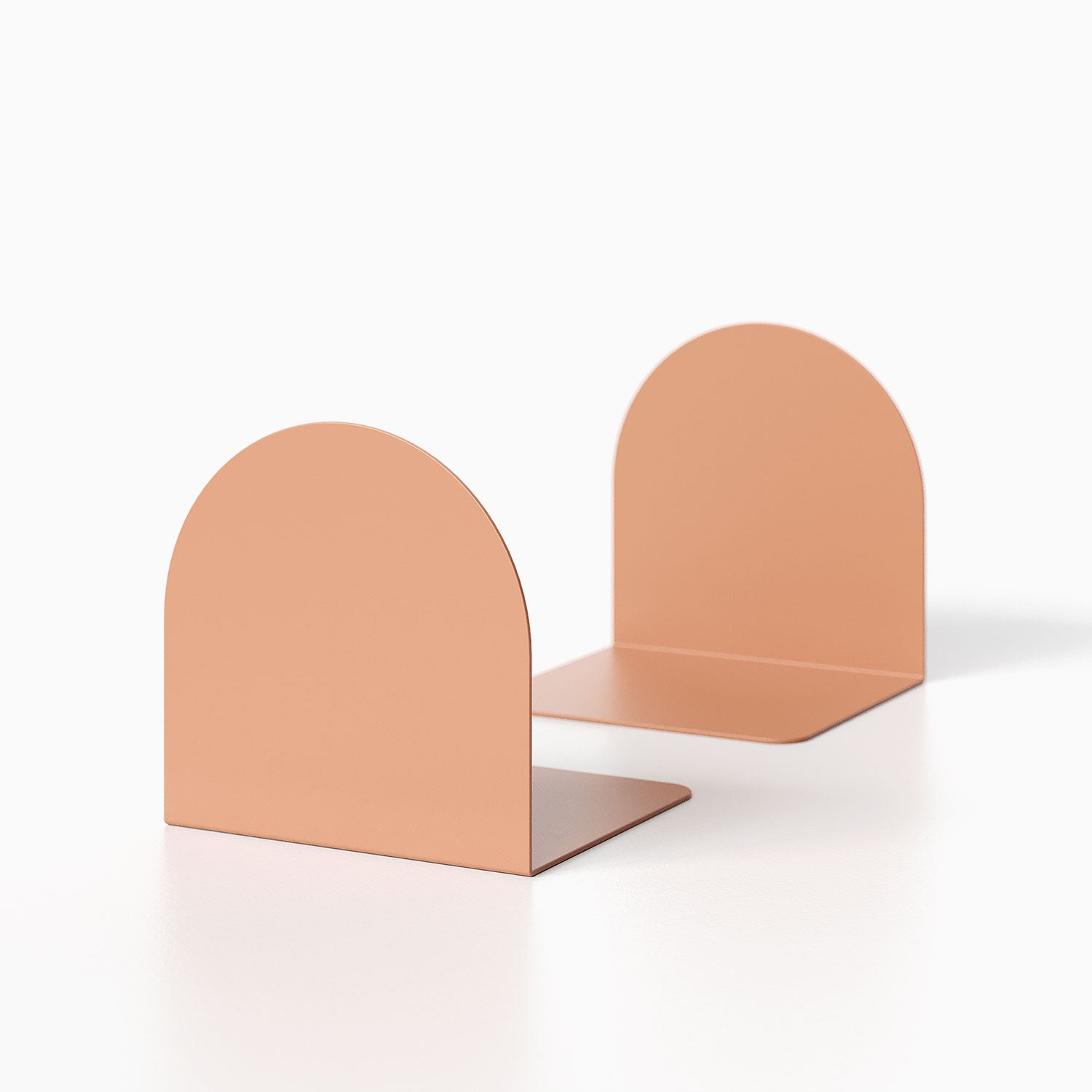 Geo Round Bookend (Set of Two) in matte terracotta finish with minimalist rounded arch design for organizing and displaying books or decor.