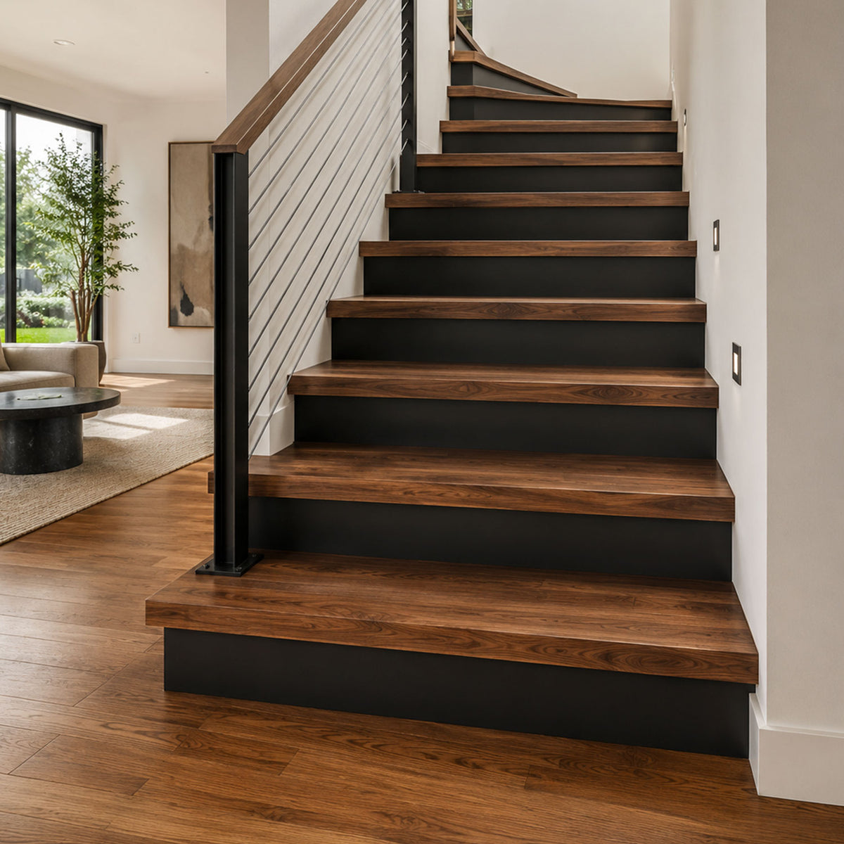Good Step Solid Wood Stair Treads installed on a modern staircase with dark wood steps and black risers in a bright home interior