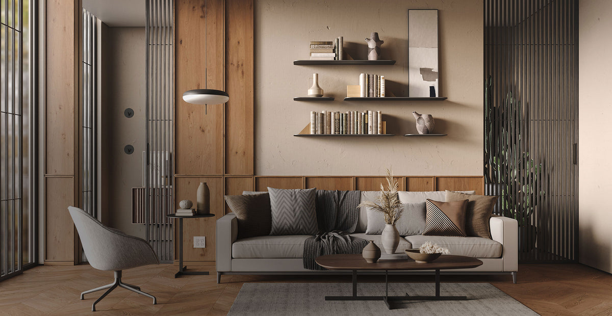 Modern living room with wood wall panels a gray sofa black coffee table and floating shelves displaying books and decor