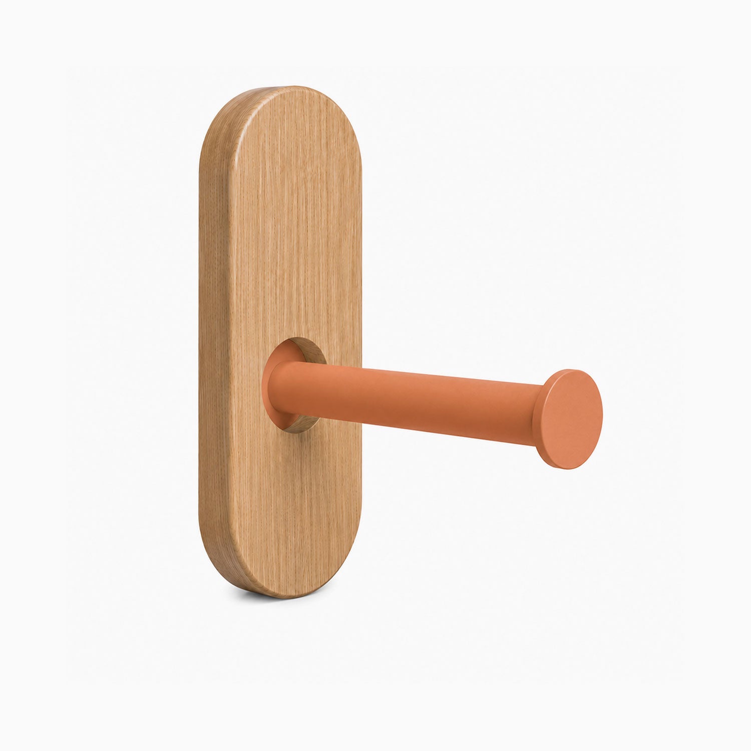 Lou Toilet Paper Holder featuring a minimalist wood backplate and a rust-resistant matte clay-colored metal arm for modern bathroom organization.
