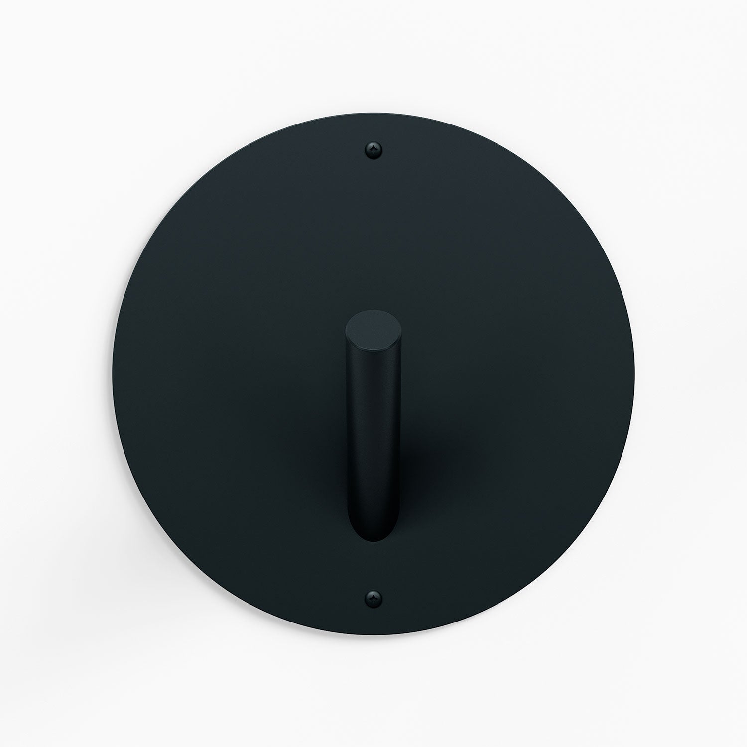 Mega Peggy Round 1 Wall Hook in matte black steel with oversized circular base for strong, minimalist wall hooks and display