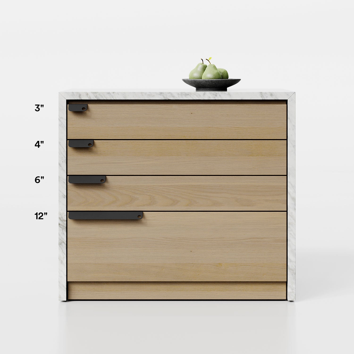 Peek Cabinet Pull in black steel shown in multiple sizes on light wood drawers for minimalist cabinet hardware solutions