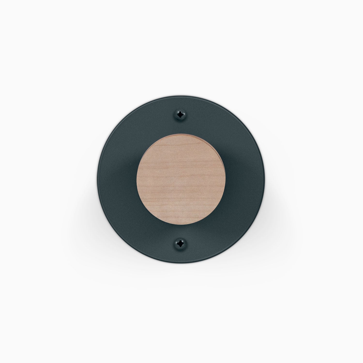 Runda Coat Rack 1 round black wall hook with a natural wood center and two visible mounting screws