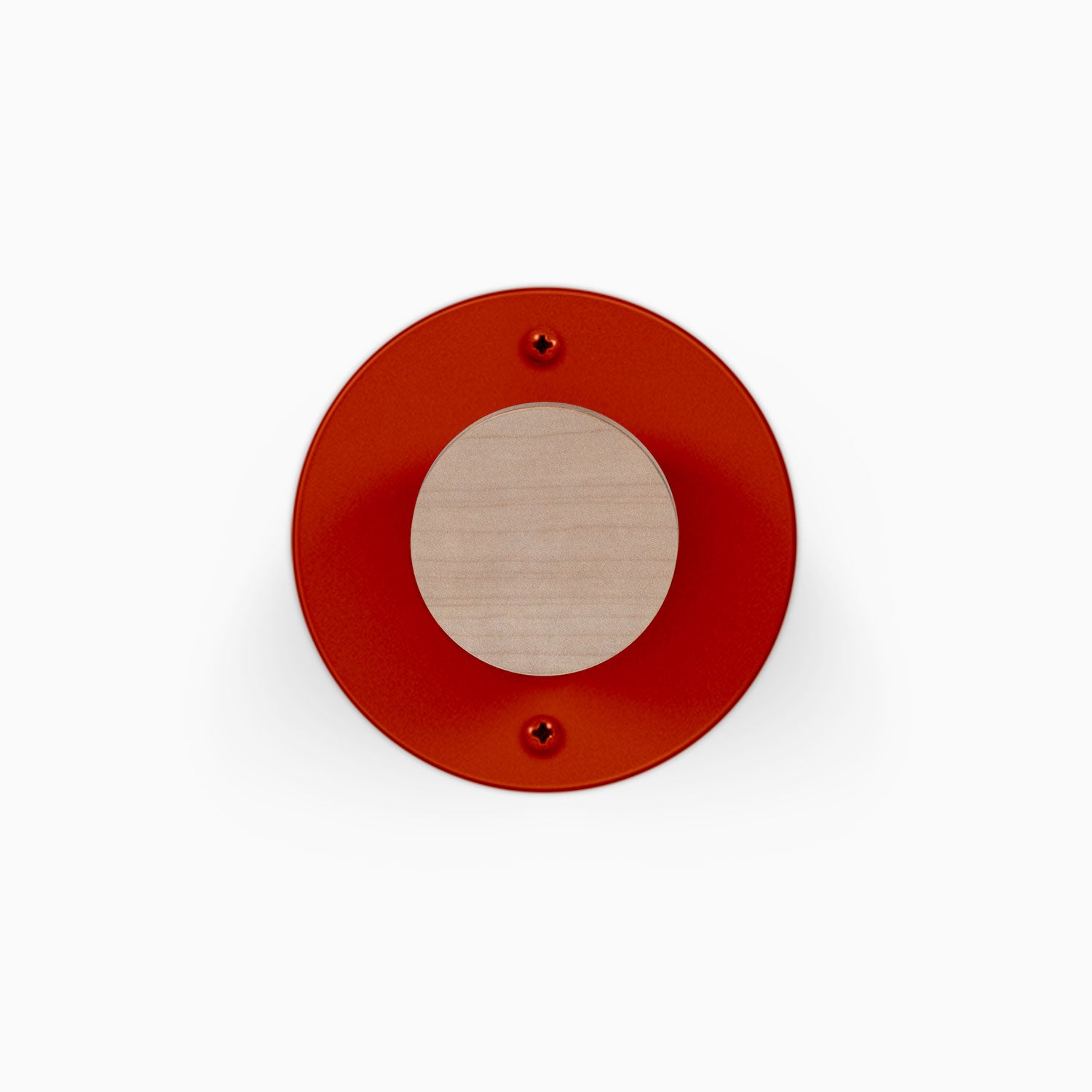 Runda Coat Rack 1 red circular wall mounted coat hook with a natural wood center and two visible mounting screws