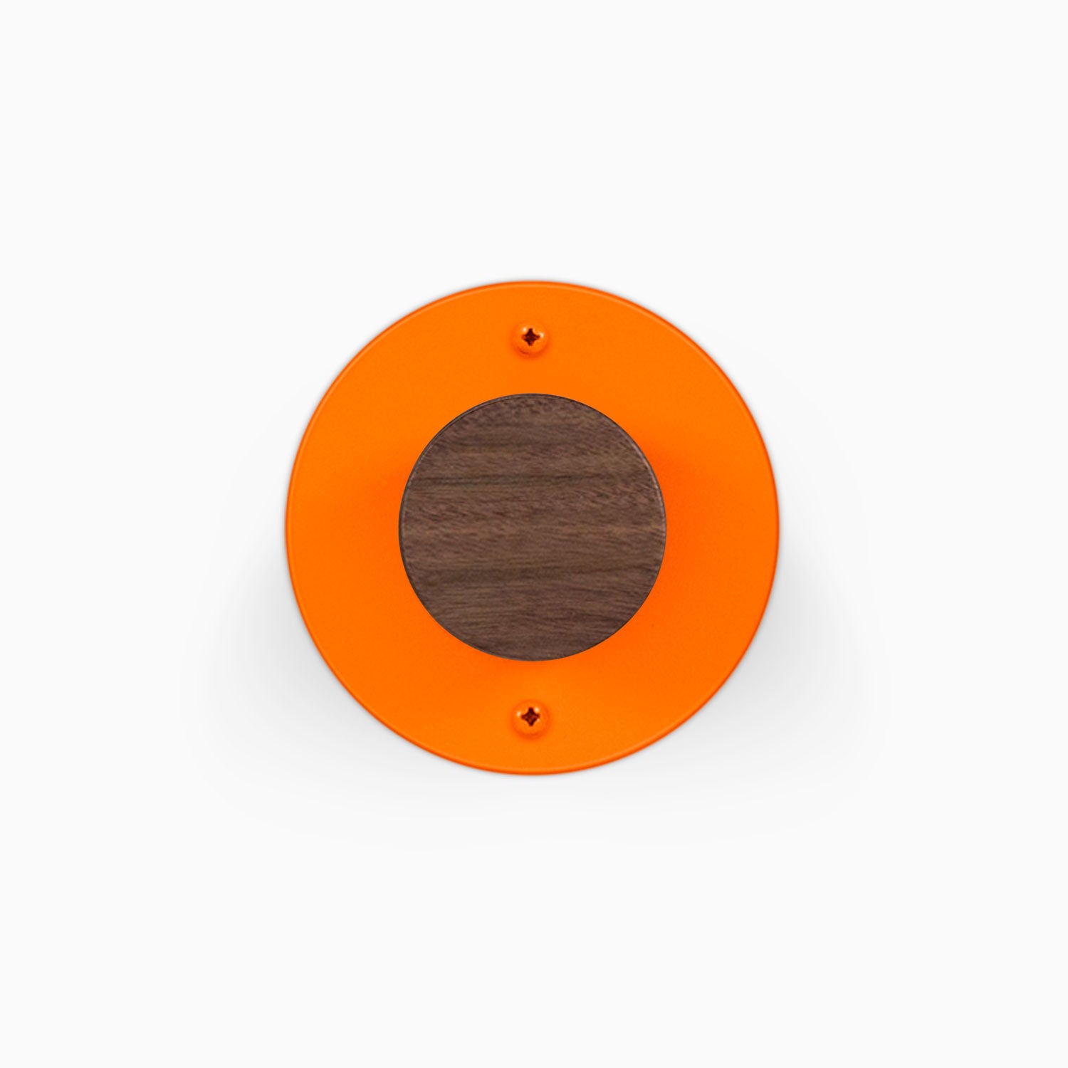 Runda Coat Rack 1 orange circular wall mounted rack with a dark wood center and two visible mounting screws