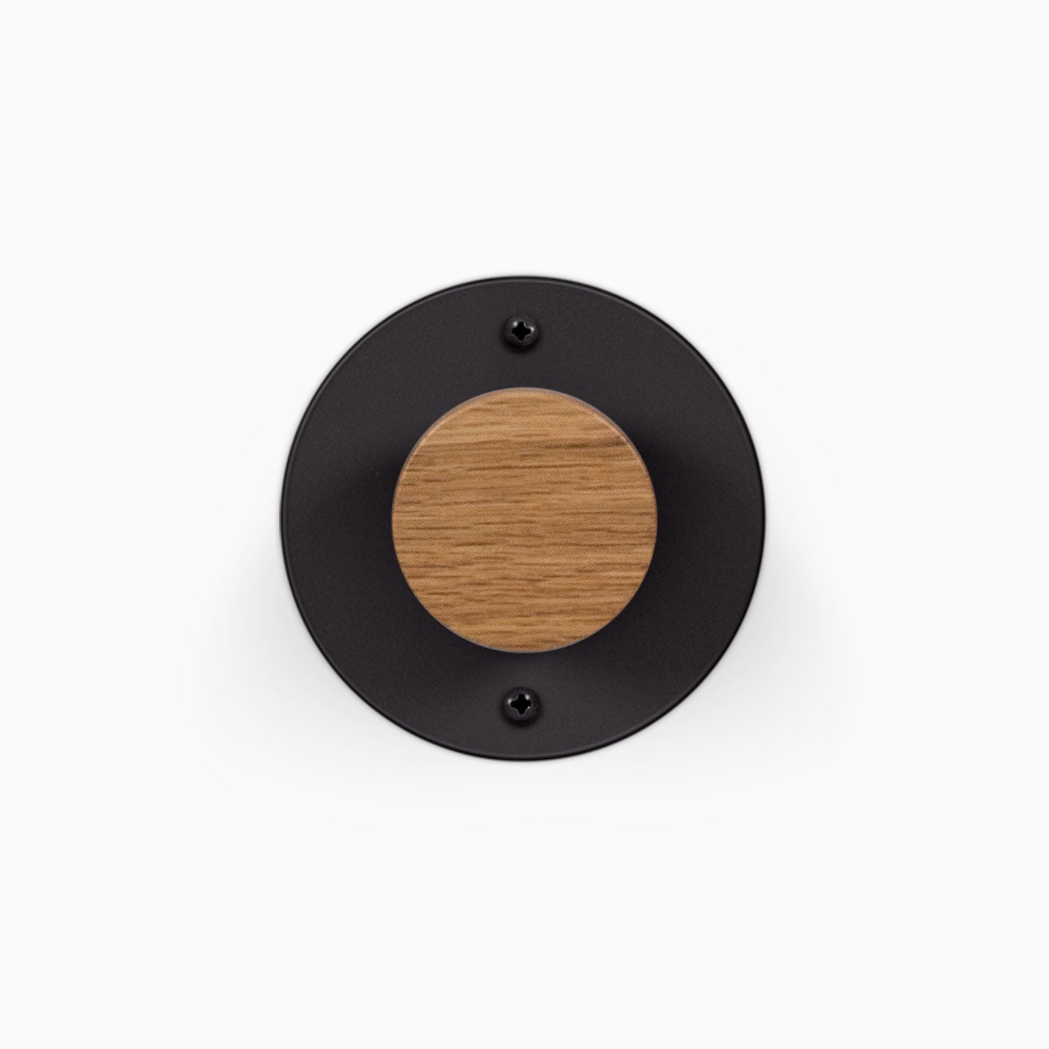 Runda Coat Rack 1 round black wall hook with a solid hardwood center and two visible mounting screws