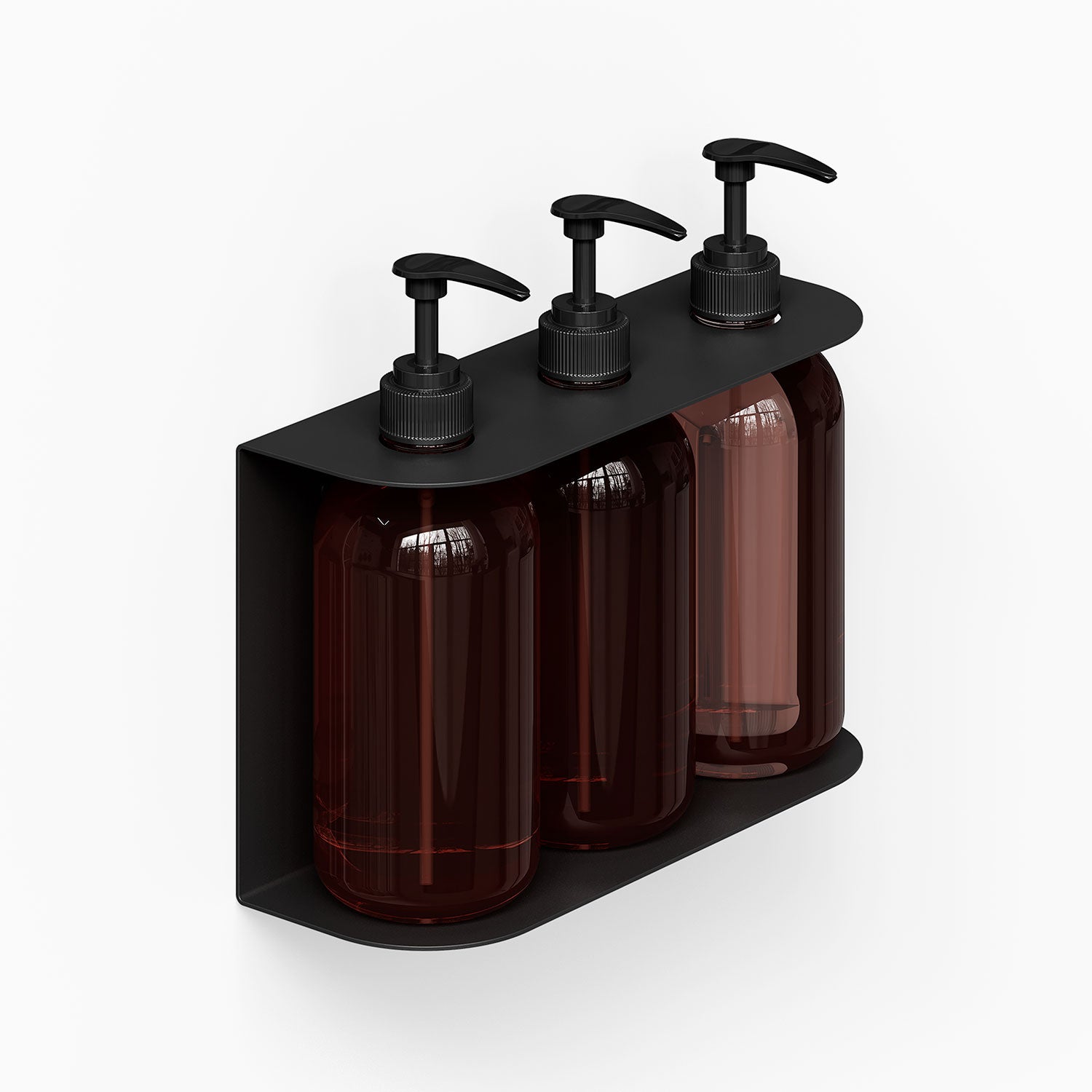 Soap Opera Shower Dispenser mounted on wall with three dark amber bottles and black pump tops in minimalist steel holder for organized bathroom storage.