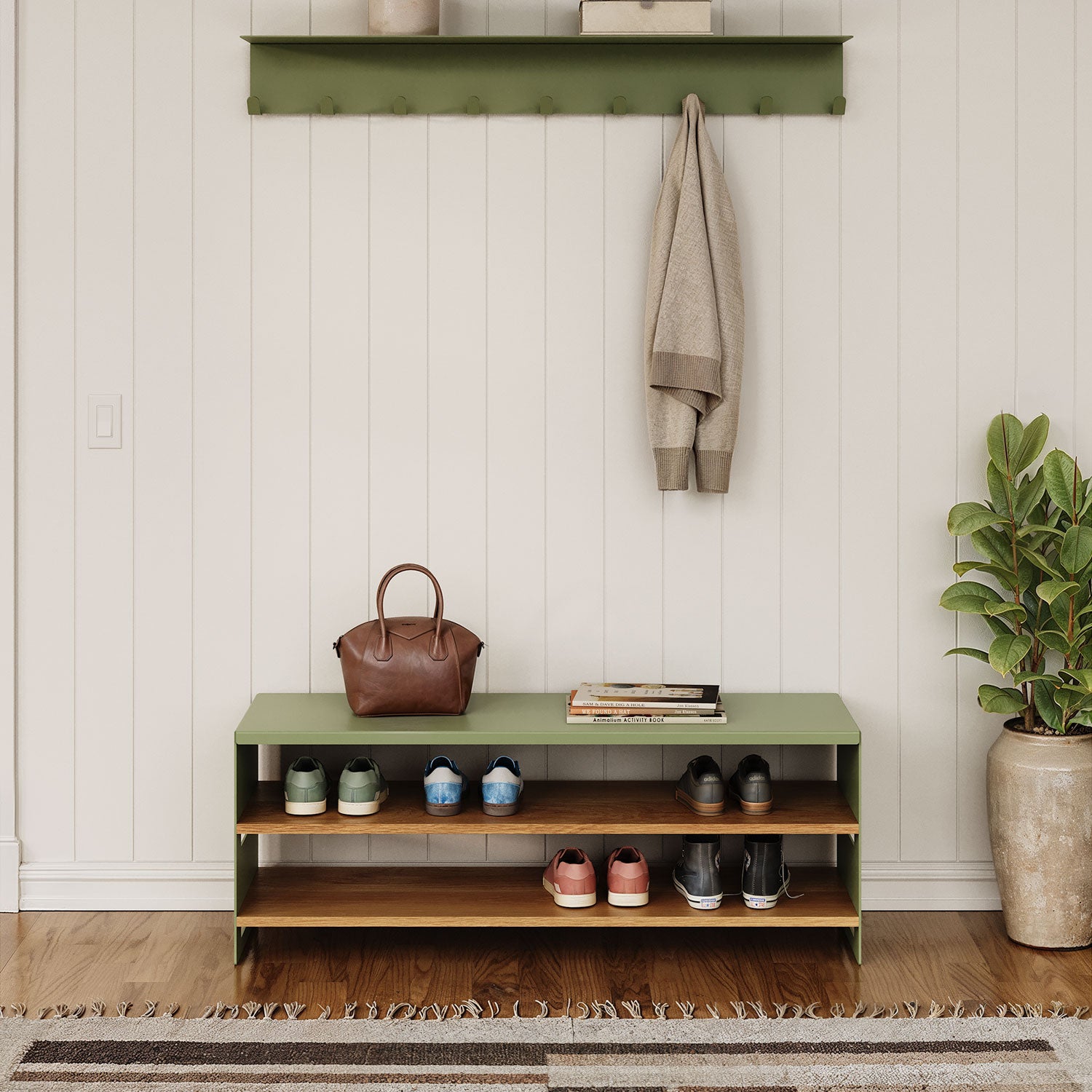 Take Five Bench + Shoe Rack in muted green with mixed-material wood and steel shelves displaying shoes and a bag, styled in a modern, minimalist entryway.