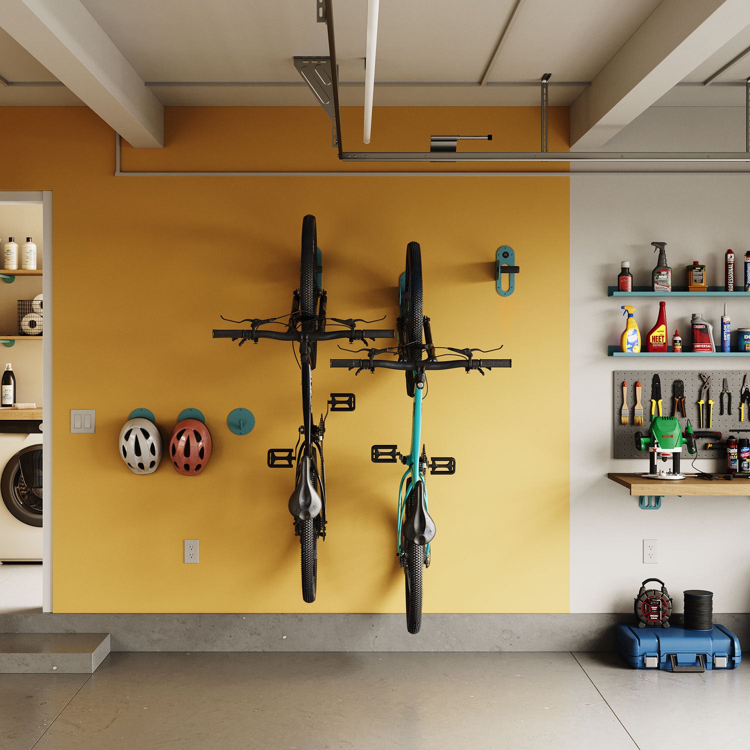 Front view of Spoke Bike Hanger mounted on wall, securely holding two bikes above garage floor — modern wall-mounted bike storage by Shelfology.