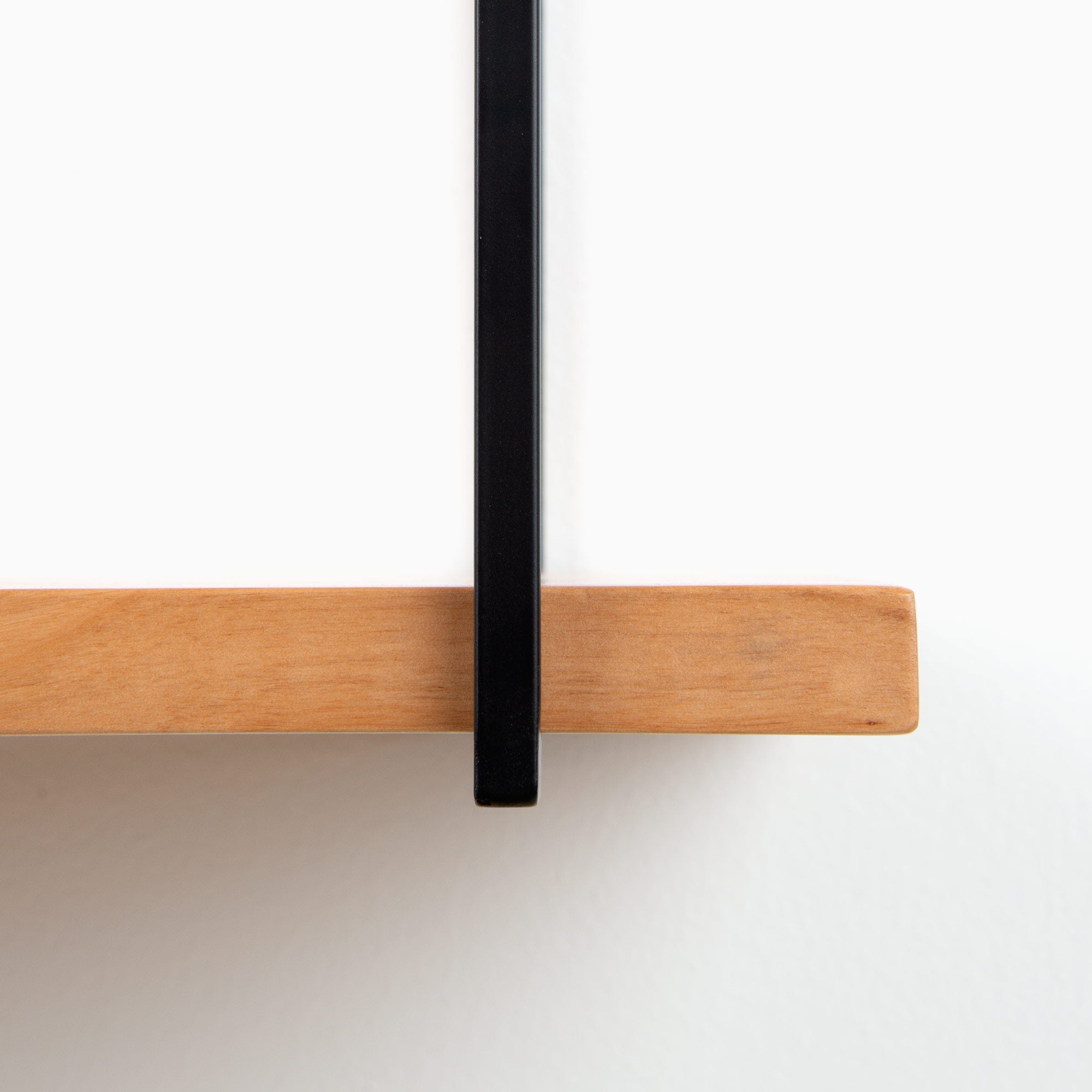 Lloyd Alder 3 Tiered Shelf with natural alder wood ledge and sleek black metal floating shelf bracket detail against white background