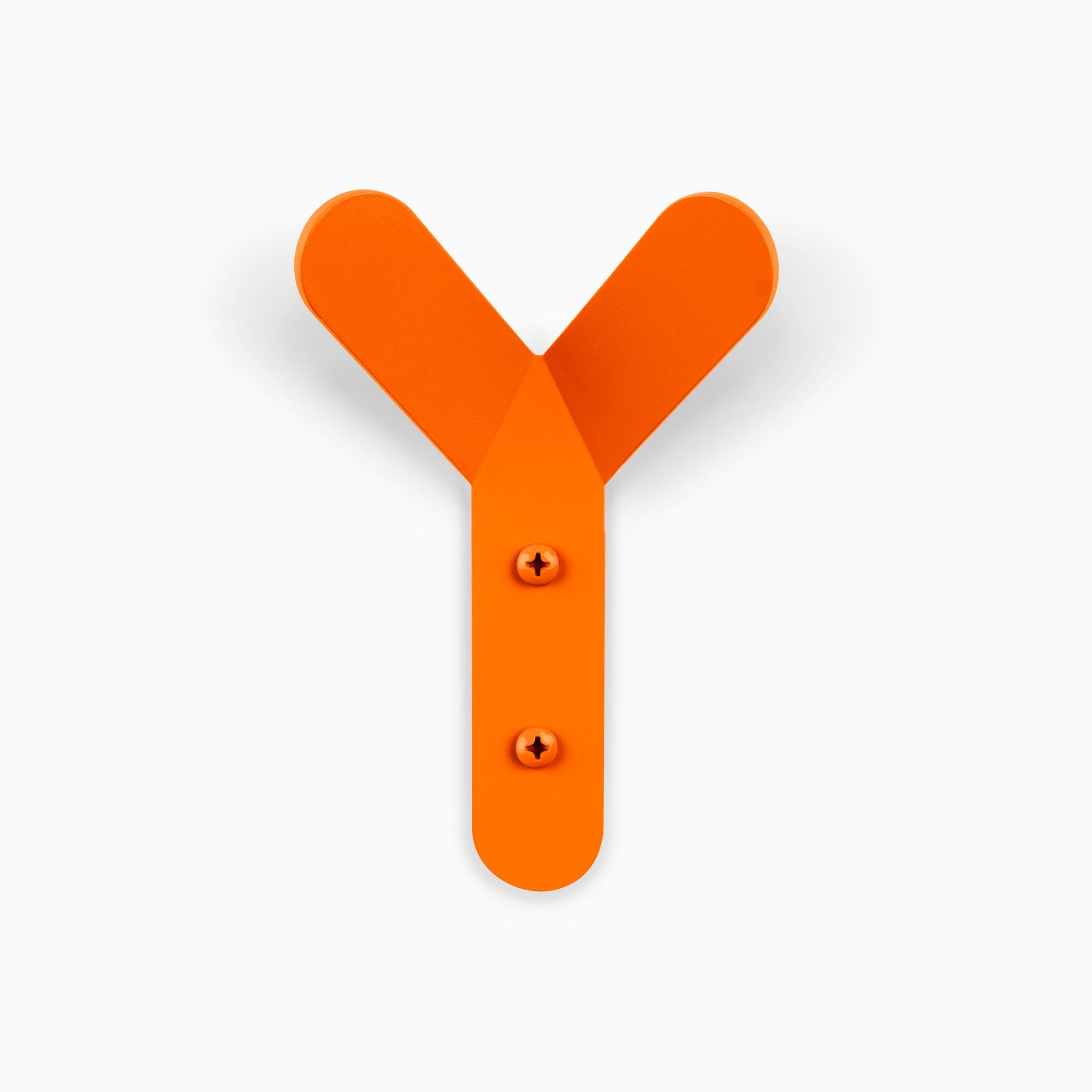 Why Not Wall Hook in vibrant orange steel with minimalist Y shape for functional wall hooks by Shelfology
