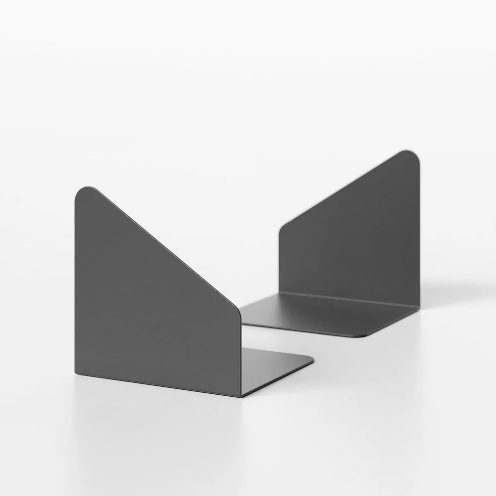 Two black metal bookends on a white background