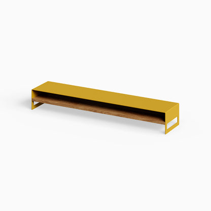 Woz Monitor Stand with a sleek mustard metal frame and solid hardwood shelf, designed for minimalist functional organization and display.
