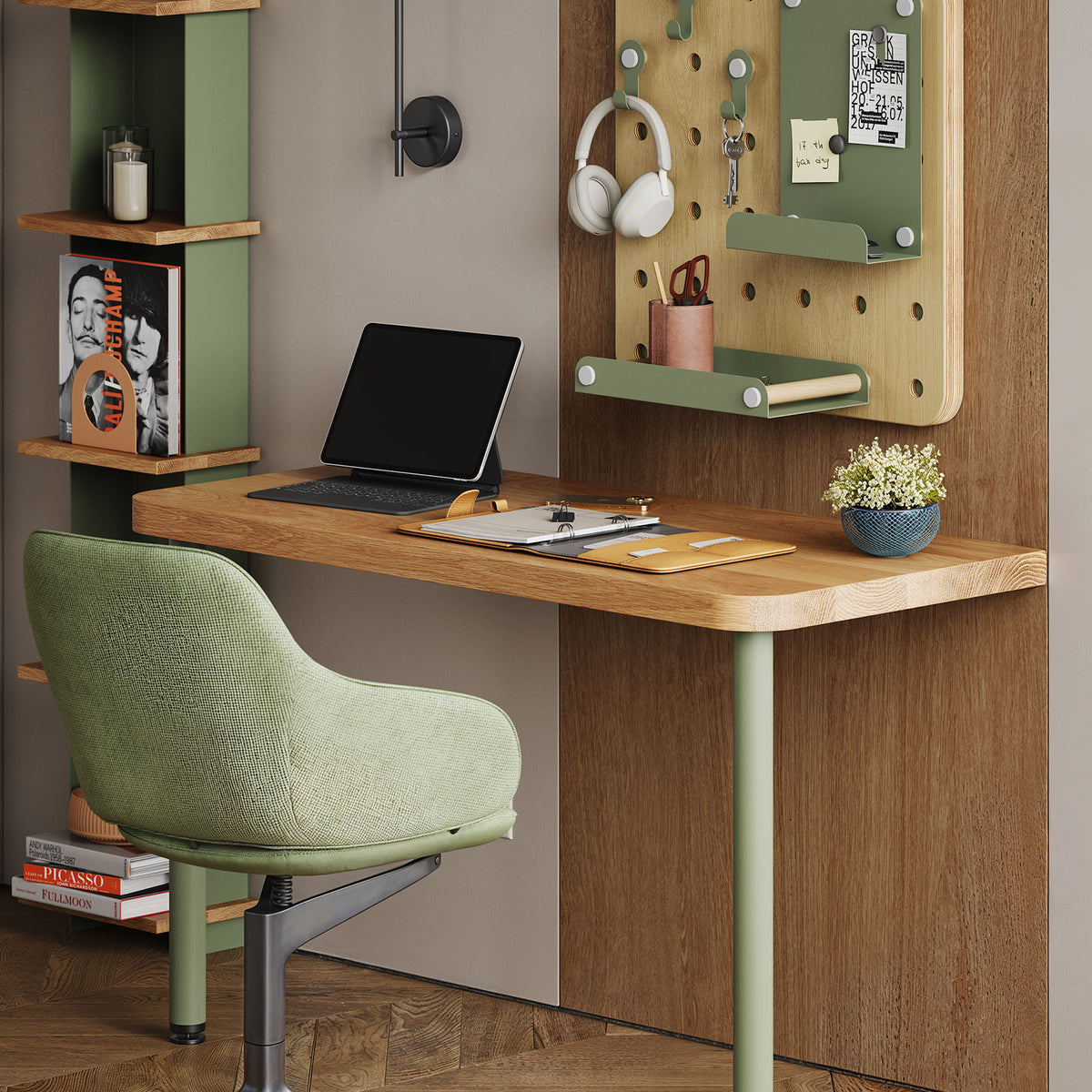 Arlo Desk - Walnut with laptop, green chair, wall organizer, open shelves, books, and desk accessories in a home office