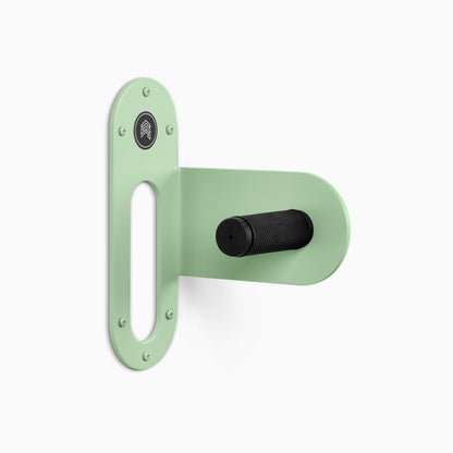 Spoke Bike Hanger – minty breath color, right orientation. Modern wall or ceiling-mounted bike hanger by Shelfology, USA-made powder coated steel.