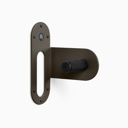 Spoke Bike Hanger – tungsten 
color, right orientation. Modern wall or ceiling-mounted bike hanger by Shelfology, USA-made powder coated steel.