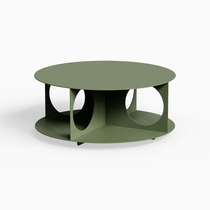 Bruno Coffee Table in muted green with minimalist circular design, featuring open sides for functional storage and display.