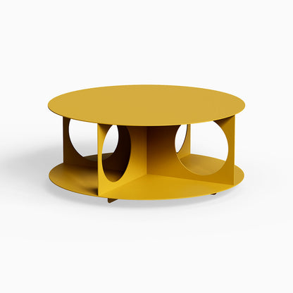 Bruno Coffee Table in mustard yellow with circular cutouts, featuring a minimalist design that maximizes functional space while adding bold color to living areas.