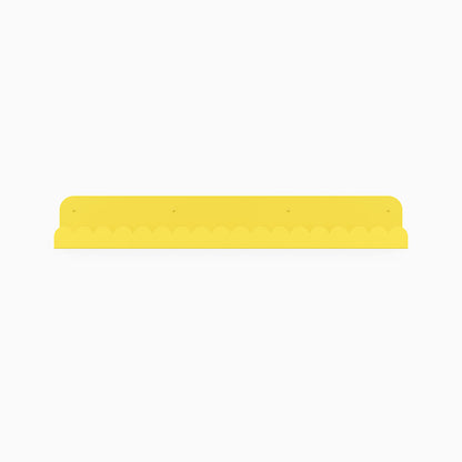 Mini Bubble Picture Ledge in bright yellow steel with scalloped mini bubble detail for vibrant wall display and organization