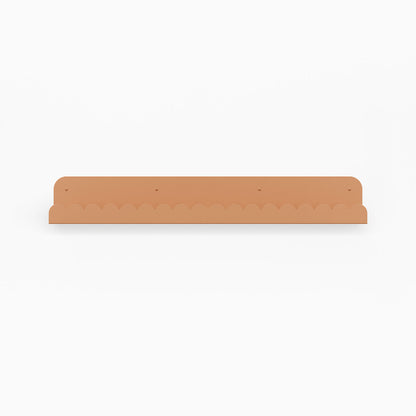 Mini Bubble Picture Ledge in clay steel with subtle mini bubble detail for functional floating shelf and wall display