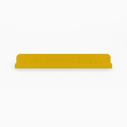 Mini Bubble Picture Ledge in warm honey mustard steel with subtle scalloped mini bubble pattern for wall organization and display