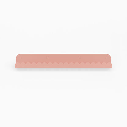 Mini Bubble Picture Ledge in soft pink steel with compact mini bubble pattern for functional floating shelf and wall display