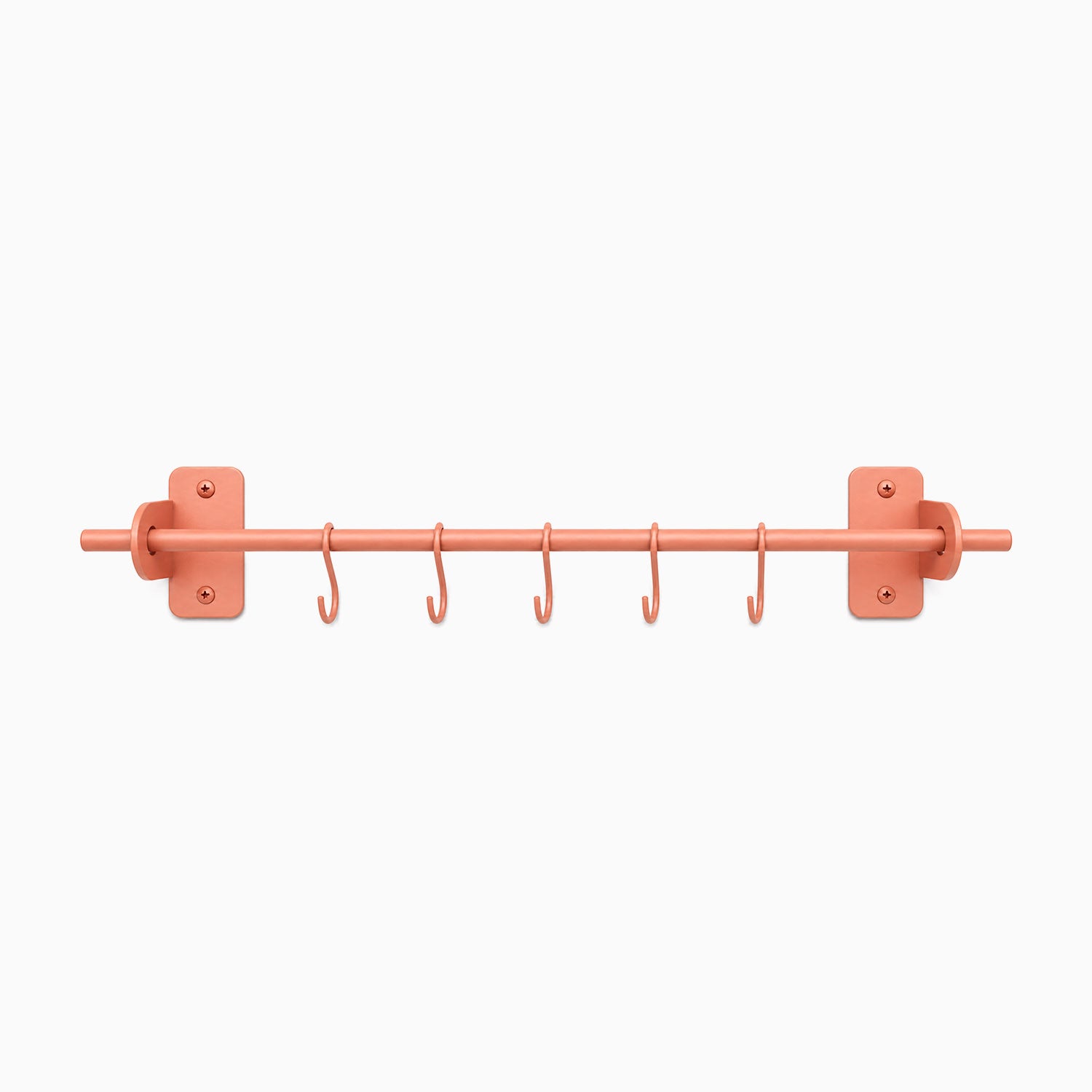 Etta Utensil Rack in matte coral finish with wall mounts and six hooks, a minimalist, durable metal wall shelf bracket for organizing utensils.