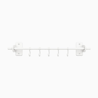 White minimalist Etta Utensil Rack with six hooks designed for organizing kitchen tools, crafted for durability and functional wall storage.