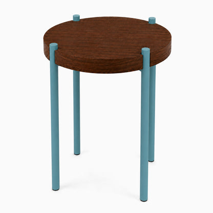 Fern Plant Stand (Walnut) with solid walnut round top and powder-coated steel legs in blue, combining modern mixed-material design and durable craftsmanship.