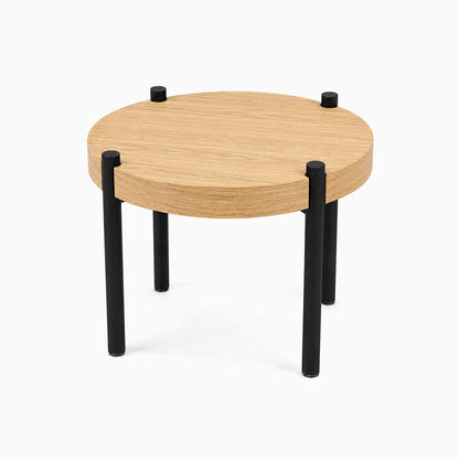 Fern Plant Stand (White Oak) with a round solid wood top and sturdy black metal legs, minimalist design perfect for modern home decor.