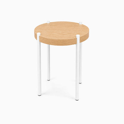 Fern Plant Stand (White Oak) with a round white oak top and four slim white metal legs, showcasing a minimalist design for stylish plant display.