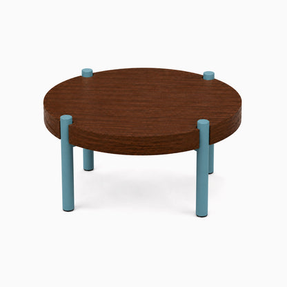 Fern Plant Stand (Walnut) featuring a round solid walnut top with four sturdy light blue steel legs, blending wood and metal for modern display.