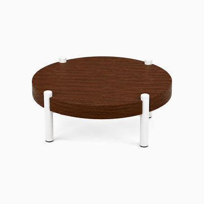 Fern Plant Stand (Walnut) featuring a minimalist round walnut wood top supported by sturdy white metal legs, perfect for stylish plant display.