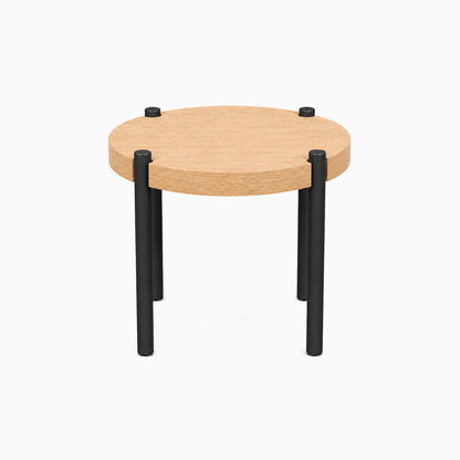 Fern Plant Stand (White Oak) with a round solid hardwood top and sturdy black metal legs, designed for minimalist functional display.