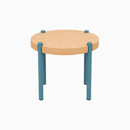 Fern Plant Stand (White Oak) featuring a minimalist round solid hardwood top with sturdy blue steel legs, designed by Shelfology for stylish display and organization.