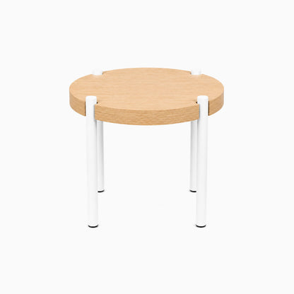 Fern Plant Stand (White Oak) with a minimalist round solid hardwood top and sturdy white steel legs, designed for functional modern spaces.