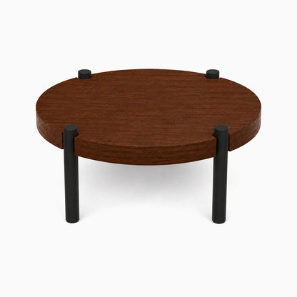 Fern Plant Stand (Walnut) featuring a minimalist round walnut platform supported by sturdy black metal legs, perfect for stylish plant display.