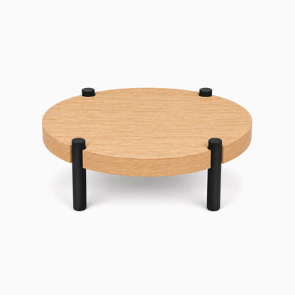 Fern Plant Stand (White Oak) featuring a minimalist round white oak top with sturdy black metal legs, designed for functional, stylish display and organization.