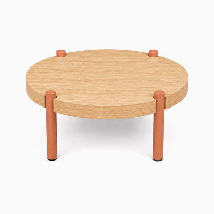 Fern Plant Stand (White Oak) with round solid white oak wood top and rust-resistant metal legs in muted orange, designed for functional, minimalist display and organization.