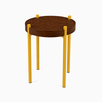 Fern Plant Stand (Walnut) featuring a minimalist round solid hardwood walnut top supported by four sturdy yellow metal legs, perfect for stylish plant display.