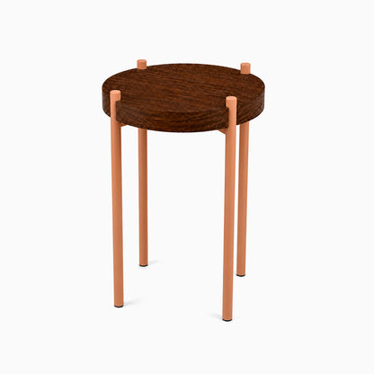Fern Plant Stand (Walnut) featuring a minimalist round walnut wood top supported by four slim, sturdy light-colored legs, perfect for stylish plant display.