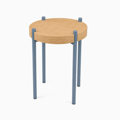 Minimalist Fern Plant Stand (White Oak) featuring a round solid hardwood top supported by durable steel legs with a sleek mixed-material design.